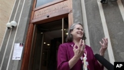 Karen King, a professor at Harvard Divinity School, is interviewed outside the Augustinianum institute in Rome, where an international congress on Coptic studies is being held, Sept. 19, 2012.