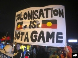 A small group of indigenous protesters blocked a Gold Coast road, bringing a temporary halt to the Queen's baton relay before the opening ceremony for the 2018 Commonwealth Games at Carrara Stadium on the Gold Coast, Australia, April 4, 2018.