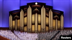 FILE - The Mormon Tabernacle Choir sings at the first session of the Church of Jesus Christ of Latter-day Saints' 185th annual General Conference in Salt Lake City, Utah, April 4, 2015.