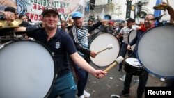 Demonstrators play drums during a national strike in Buenos Aires, Argentina April 30, 2019. 
