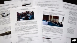 Special counsel Robert Mueller's redacted report on the investigation into Russian interference in the 2016 presidential election is photographed, April 18, 2019, in Washington. 