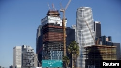 FILE - The new Metropolis project, which is being built by Chinese developer Greenland, is seen in downtown Los Angeles from the 110 freeway in Los Angeles, California, United States, Nov. 12, 2015. 