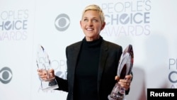Ellen DeGeneres poses backstage with her Humanitarian Award and Award for Favorite Daytime TV Host during the People's Choice Awards 2016 in Los Angeles, California, Jan. 6, 2016. 