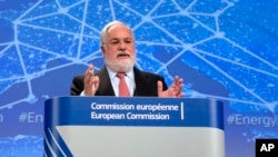 FILE - European Commissioner for Climate Action and Energy Miguel Arias Canete is seen speaking during a media conference at EU headquarters in Brussels, Feb. 25, 2015.