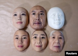 Super-realistic face masks are displayed at factory of REAL-f Co. in Otsu, western Japan, Nov. 15, 2018.