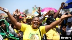 A supporter gestures during an address by African National Congress (ANC) President Cyril Ramaphosa during the Congress' 106th anniversary celebrations, in East London, South Africa, Jan. 13, 2018.