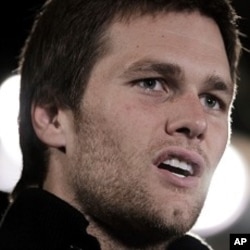 New England Patriots quarterback Tom Brady answers questions during a news conference on Wednesday, Feb. 1, 2012, in Indianapolis.