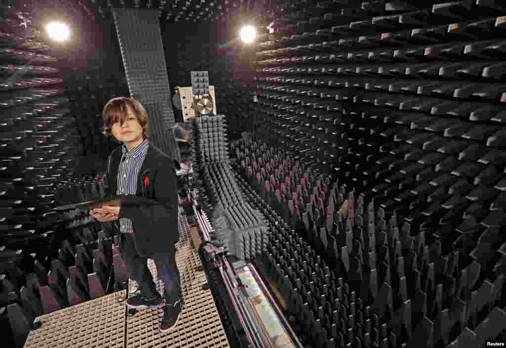 Nine-year-old Belgian student Laurent Simons, who studies electrical engineering and will soon become the youngest university graduate in the world, poses in a laboratory at the University of Technology in Eindhoven, Netherlands, Nov. 20, 2019.