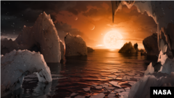 This illustration shows the possible surface of TRAPPIST-1f, one of the newly discovered planets in the TRAPPIST-1 system. Scientists using the Spitzer Space Telescope and ground-based telescopes have discovered that there are seven Earth-size planets in