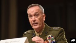FILE - Joint Chiefs Chairman Gen. Joseph Dunford, shown testifying on Capitol Hill in Washington, Oct. 27, 2015, says Egyptian forces "are taking the fight to the Islamic State right now."