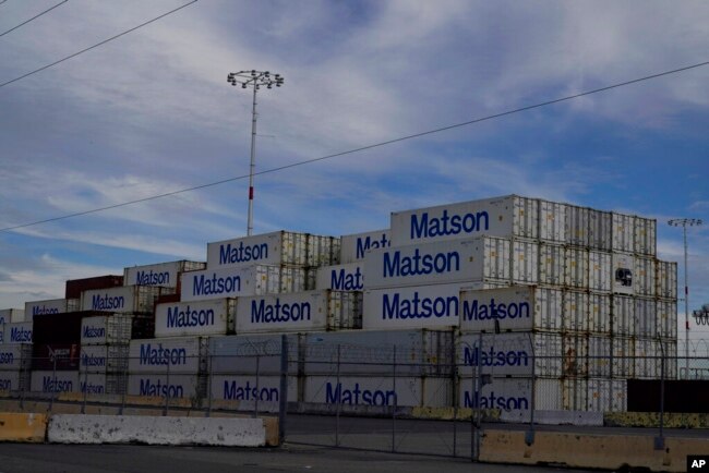 FILE - Shipping containers are shown at the Port of Oakland in Oakland, Calif., Feb. 18, 2021.