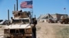 Un véhicule blindé des forces américaines, à Manbij, au nord de la Syrie, mercredi 4, 2018. (Photo AP / Hussein Malla)