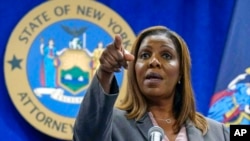 FILE - New York Attorney General Letitia James acknowledges questions from journalists at a news conference, in New York, May 21, 2021.