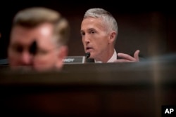 FILE - Rep. Trey Gowdy, R-S.C. questions Former Homeland Security Secretary Jeh Johnson as he testifies to the House Intelligence Committee task force on Capitol Hill in Washington, June 21, 2017, as part of the Russia investigation.