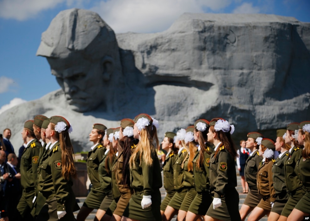 Belarusian cadets march past Brest Fortress monument during a Victory Day rally marking 71 years after the victory in WWII in the town of Brest, 360 kilometers (223 miles) southwest of Minsk, Belarus.