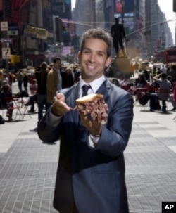 'Delicatologist' David Sax, the author of 'Save the Deli,' is about to enjoy a pastrami sandwich in Times Square.