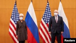 U.S. Deputy Secretary of State Wendy Sherman and Russian Deputy Foreign Minister Sergei Ryabkov attend security talks at the United States Mission in Geneva, Switzerland Jan. 10, 2022. 