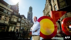 Christian Prudhomme, general director of the Tour de France, poses in the center of Utrecht, The Netherlands on July 1, 2015 prior to the start of the Tour de France cycling race on July 4. 