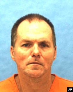 FILE - This undated photo provided by the Florida Department of Corrections shows Mark Asay.