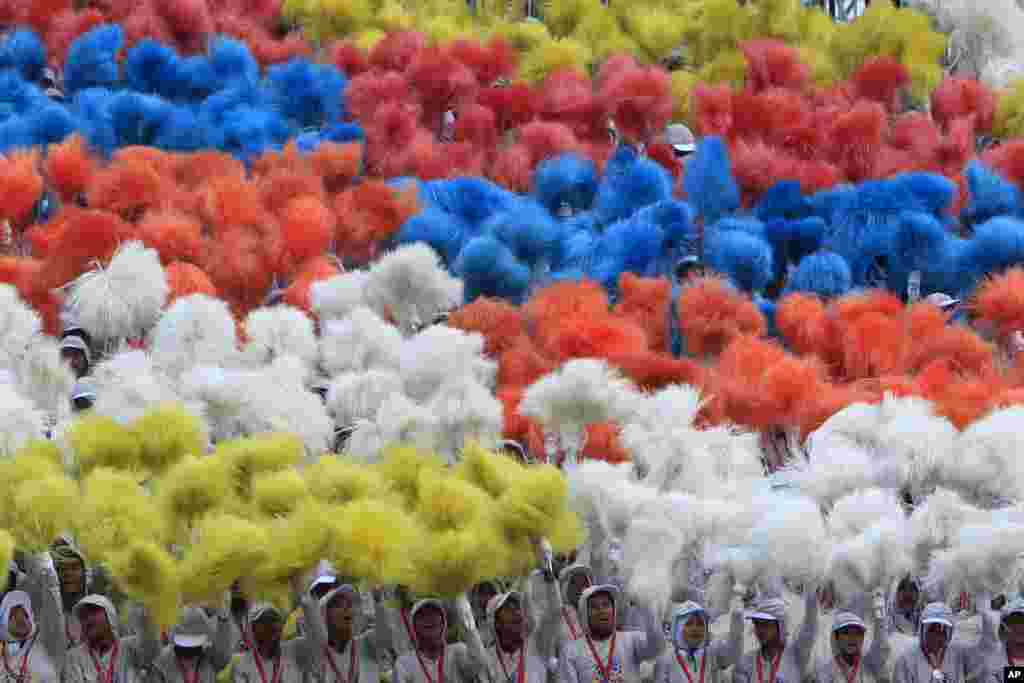 Malaysian students perform during the 57th National Day celebrations at Independence Square in Kuala Lumpu.