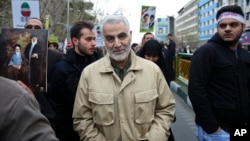 FILE - Revolutionary Guard General Qassem Soleimani attends an annual rally commemorating the anniversary of the 1979 Islamic revolution, in Tehran, Iran, Feb. 11 2016.