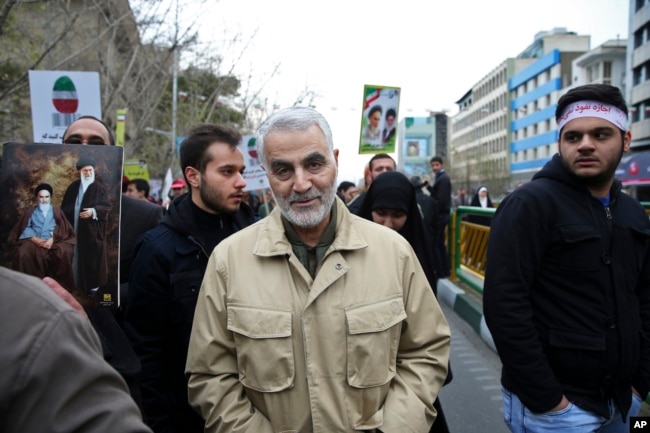 FILE - Revolutionary Guard General Qassem Soleimani attends an annual rally commemorating the anniversary of the 1979 Islamic revolution, in Tehran, Iran, Feb. 11 2016.