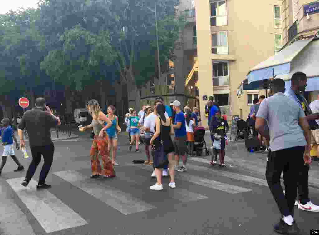 French fans were literally dancing in the streets after the match, in Paris, France, July 15, 2018. (L. Bryant/VOA)