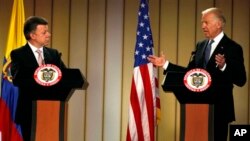 Vice President Joe Biden, right, speaks during a joint press conference with Colombia's President Juan Manuel Santos in Bogota, Colombia May 27, 2013