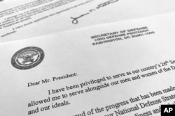 FILE - Part of Defense Secretary Jim Mattis' resignation letter to President Donald Trump is photographed in Washington, Dec. 20, 2018.