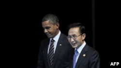 Барак Обама и Ли Мен Бак