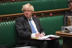 British Prime Minister Boris Johnson takes questions in Parliament, in London, Britain June 23, 2021.