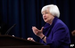 Federal Reserve Chair Janet Yellen, shown answering a reporter's question in Washington, Dec. 16, 2015, is among several Fed speakers scheduled to make appearances this week.