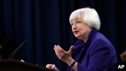 FILE - Federal Reserve Chair Janet Yellen answers a question during a news conference in Washington, Dec. 16, 2015. She is likely to weigh in on a possible hike in interest rates when she attends an award ceremony Friday at Harvard University.
