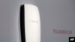 Tesla's Powerwall battery is unveiled on stage in Hawthorne, Calif., on April 30, 2015.