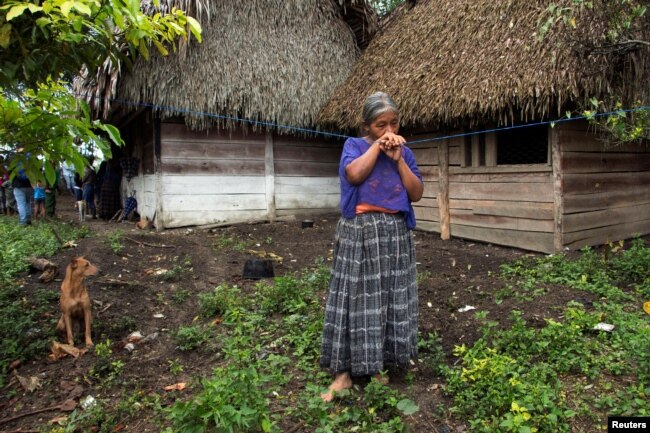 Elvira Choc, 59, grandmother of Jakelin Caal Maquin, a 7-year-old girl who died in U.S. custody, stands outside her house in Raxruha, Guatemala, Dec. 15, 2018.