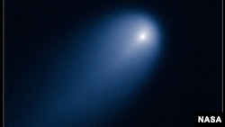 NASA’s Hubble Space Telescope provides a close-up look of Comet ISON (C/2012 S1), as photographed on April 10, 2013, when the comet was slightly closer than Jupiter’s orbit at a distance of 386 million miles from the sun. 