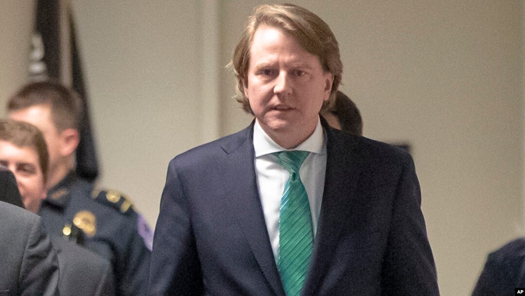FILE - President Trump's White House counsel, Don McGahn, right, is seen on Capitol Hill in Washington, Feb. 6, 2017.