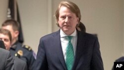 FILE - President Trump's White House counsel, Don McGahn, right, is seen on Capitol Hill in Washington, Feb. 6, 2017.