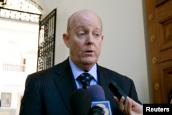 FILE - U.S. diplomat John Caulfield is pictured in Caracas, Jan. 11, 2010. Caulfield, the head of the U.S. Interests Section in Cuba from 2011 to 2014, is one of several former U.S. and Canadian diplomats who said they had been targets of low-level harassment and intimidation by Cuban agents in the 1980s, 1990s and 2000s.