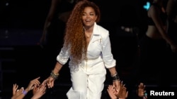 Janet Jackson takes the stage to accept the Ultimate Icon Award during the 2015 BET Awards in Los Angeles, California, June 28, 2015.
