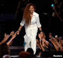 Janet Jackson takes the stage to accept the Ultimate Icon Award during the 2015 BET Awards in Los Angeles, California, June 28, 2015.