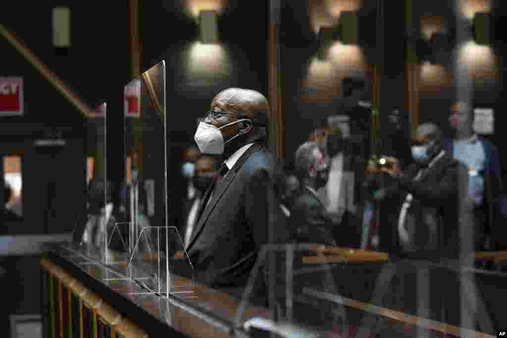 Former South African President Jacob Zuma sits in the High Court in Pietermaritzburg, South Africa.&nbsp;Zuma has demanded to be acquitted of corruption charges because of the alleged abuse he says he has has suffered at the hands of his prosecutors.