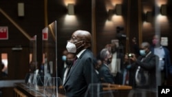 FILE - Former South African President Jacob Zuma, sits in the High Court in Pietermaritzburg, South Africa, Oct. 26, 2021. 