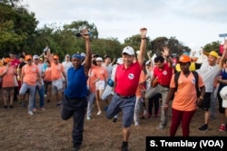 Chinese Ambassador to Tanzania Lu Youqing warms up before the ‘Walk for Elephants’ march in Dar es Salaam.