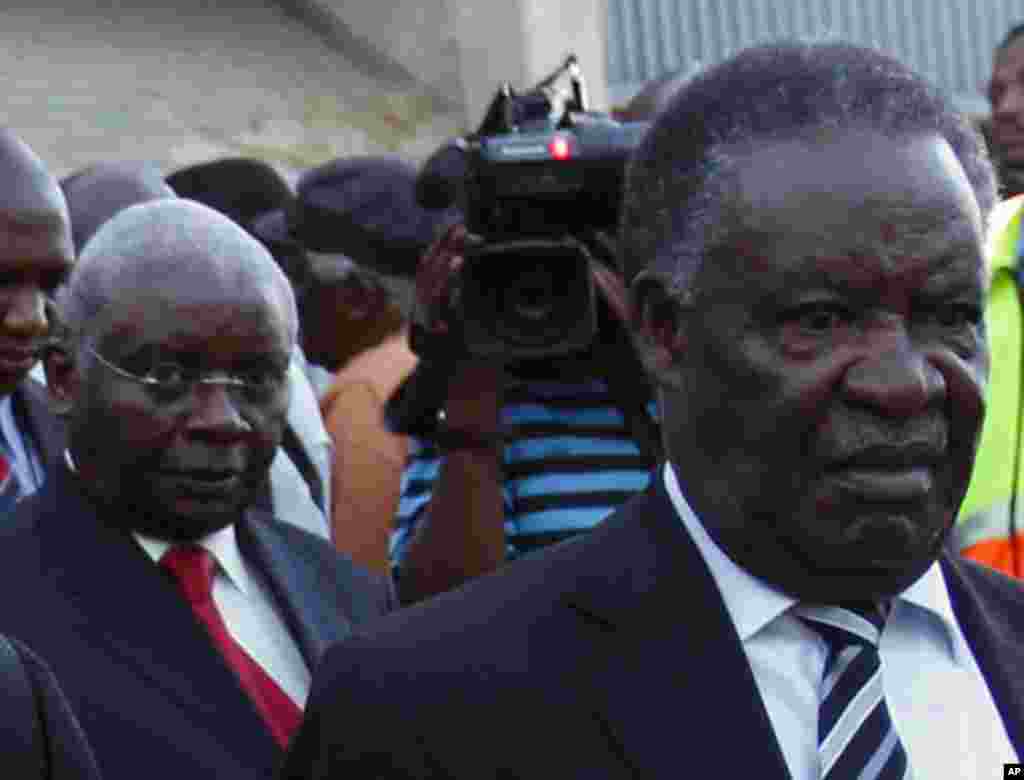 Zambia's President Michael Sata (R) arrives with Mozambique's President Armando Guebuza ahead of the upcoming African National Congress (ANC) centenary celebration in Bloemfontein January 7, 2012. South Africa's ruling ANC celebrates its 100th birthday on