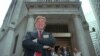 FILE - Developer Donald Trump poses for photos outside the New York Stock Exchange after the listing of his stock in New York, June 7, 1995. 