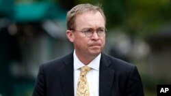 Director of the Office of Management and Budget Mick Mulvaney departs after a television interview at the White House, Sept. 13, 2017, in Washington.