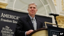 FILE - Supreme Court Justice Neil Gorsuch speaks at the 50th anniversary of the Fund for America Studies luncheon in Washington, Sept. 28, 2017. 