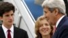 U.S. Ambassador to Japan Caroline Kennedy and her son, Jack Schlossberg, greet Secretary of State John Kerry as he arrives, ahead of G-7 foreign minister meetings, at Marine Corps Air Station Iwakuni, Japan, April 10, 2016.