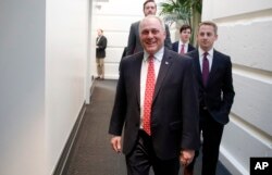Majority Whip Steve Scalise, R-La., left, arrives for a Republican caucus meeting on Capitol Hill in Washington, March 23, 2017.